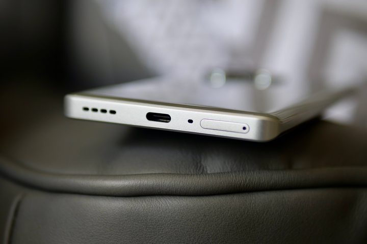 The Realme GT 6's charging port.