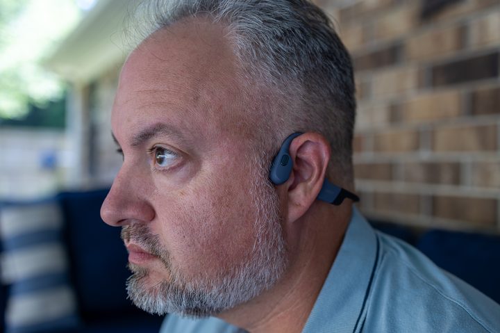 Phil Nickinson wearing the Shokz OpenSwim Pro.