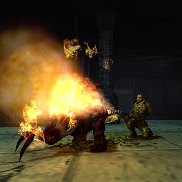 A character using a flamethrower on a Thing alien in The Thing remaster.