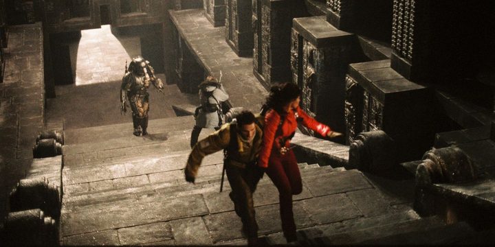 A team is chased through the temple a Predator