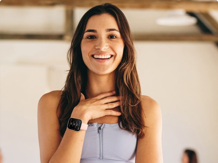 Amazfit Bip 5 Unity smartwatch worn during yoga