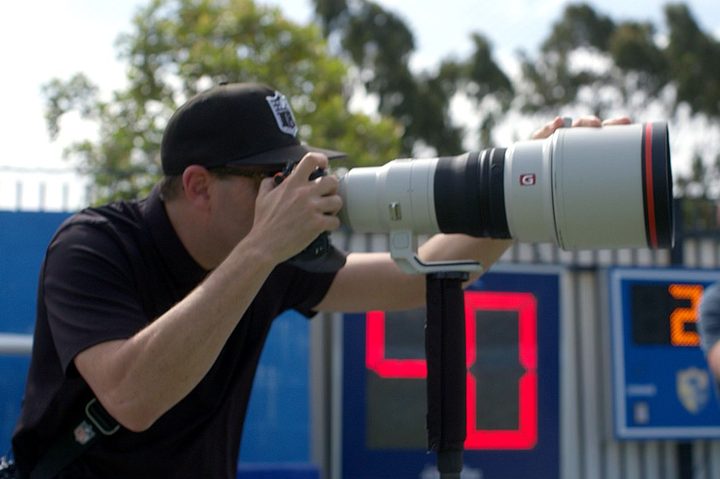 Official NFL photographer using a Sony camera and lens.