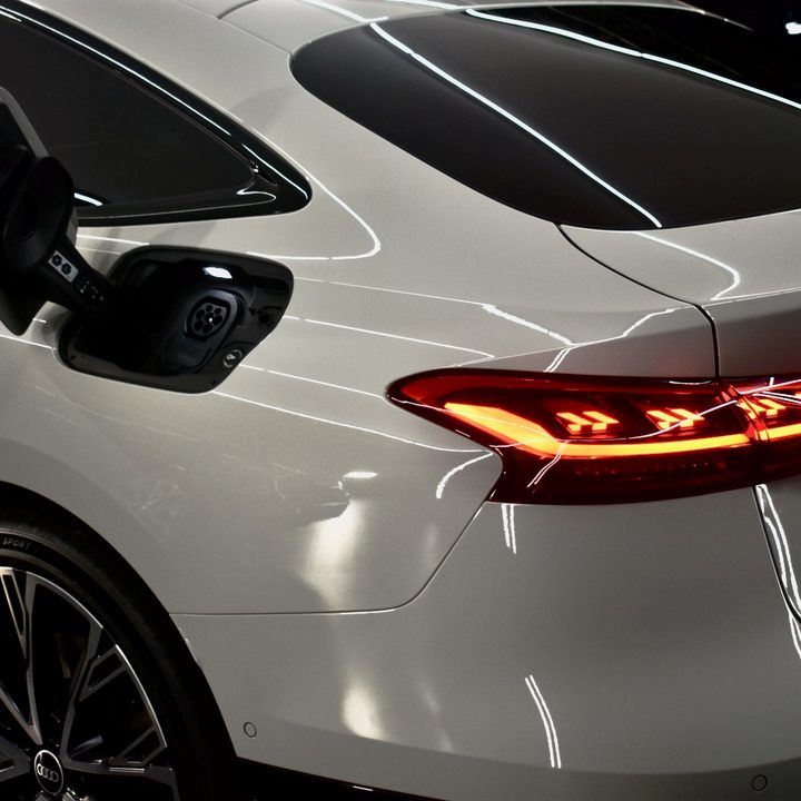 Close-up of 2025 Audi A6 e-tron charge port.