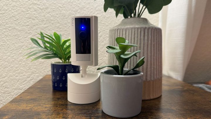 The Ring Pan-Tilt Indoor Cam placed on a table.