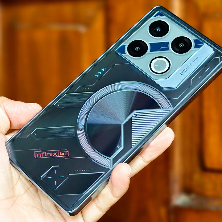 Infinix GT 20 Pro gaming phone held in hand.
