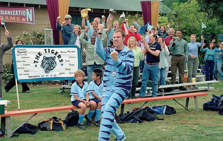Will Ferrell pumps his fist on a soccer sideline.