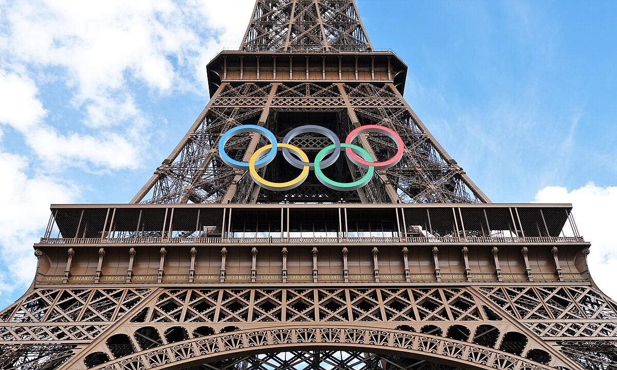 A photo of the Olympic rings on the Eiffel Tower.