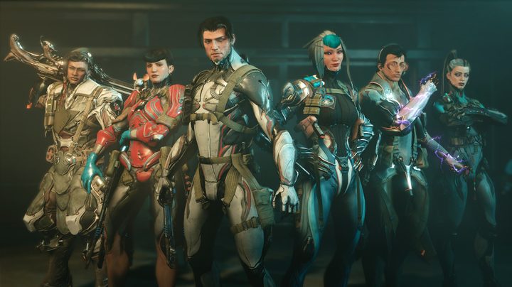 Five people, their bodies covered by technological suits, stand in a line,