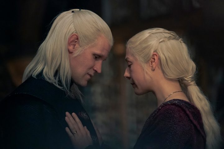 Rhaenyra presses her palm against Daemon's chest in House of the Dragon season 2.