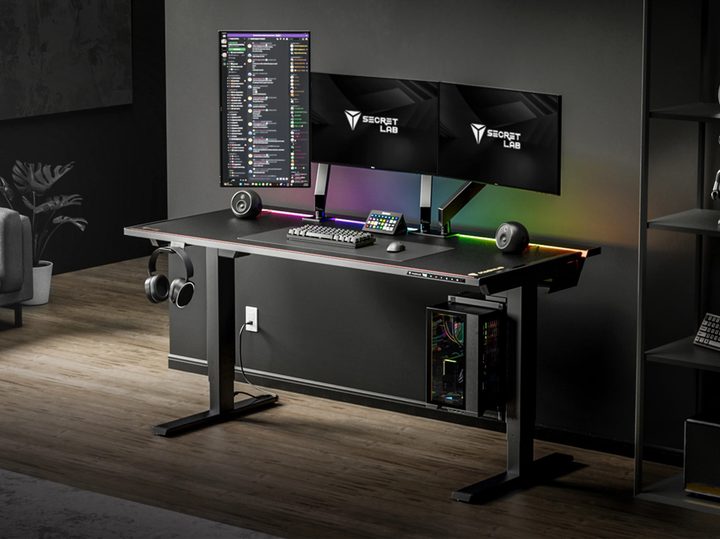 SecretLab MAGNUS Pro sit and stand desk with gaming setup