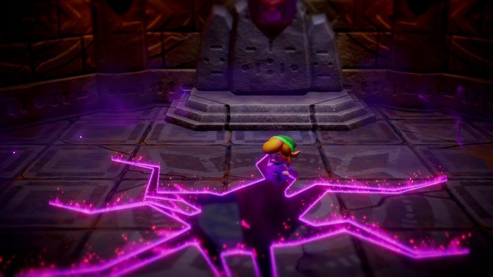 Link stuck on a big black and purple crack in a dungeon floor in The Legend of Zelda: Echoes of Wisdom.