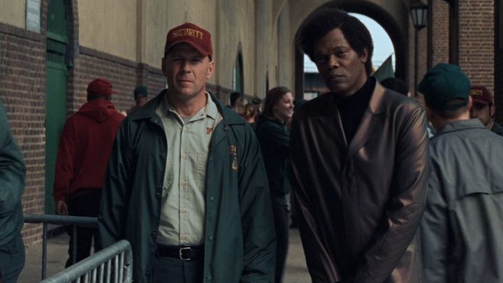 Bruce Willis and Samuel L. Jackson in Unbreakable.