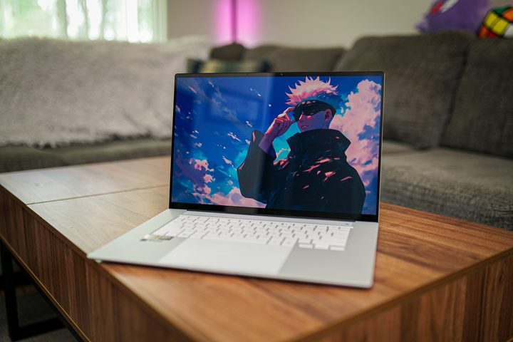 The Asus Zenbook S 16 sitting on a coffee table.