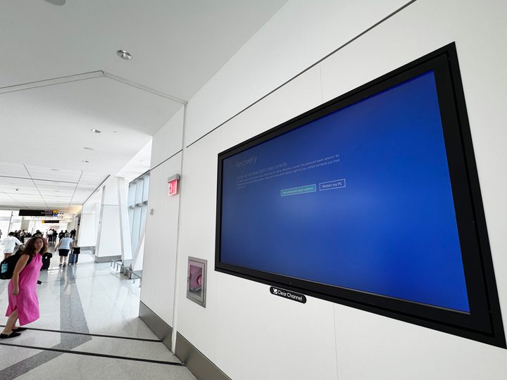 A Blue Screen of Death on a television monitor at LaGuardia Airport in New York City.