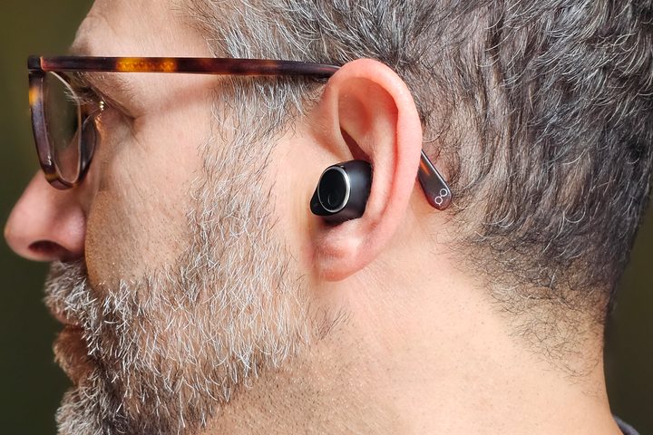 Simon Cohen wearing Cambridge Audio Melomania M100 (quarter-rear view).