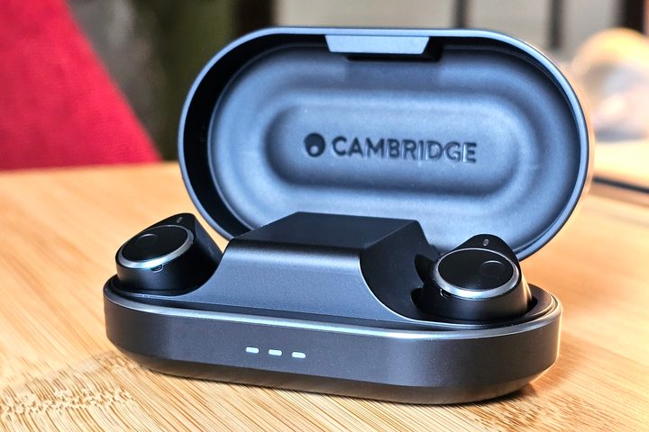 Cambridge Audio Melomania M100 in charging case, lid open.