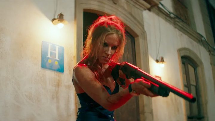 A woman aims a gun in Duchess.