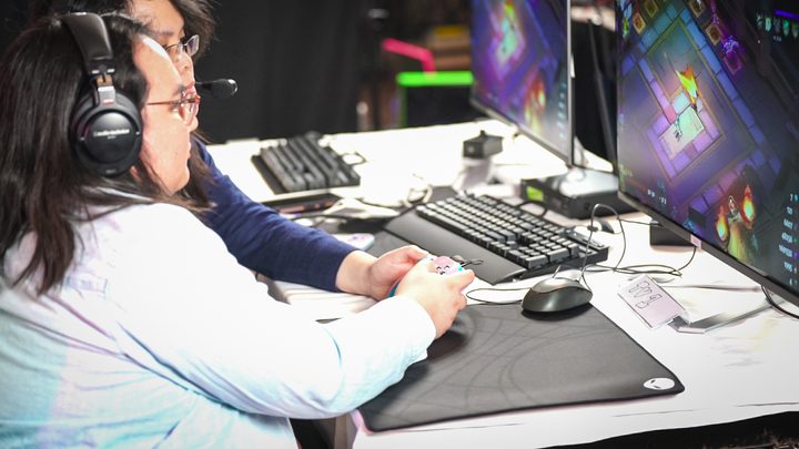 Two runners playing Hades at Games Done Quick.