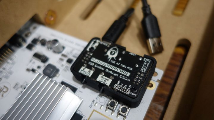 An encoder appears in an iiRcade motherboard.