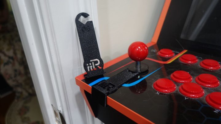 A custom joystick gate appears on an iiRcade cabinet.
