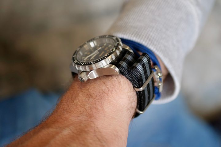 A person wearing the Marathon 41mm Jeep Rubicon GSAR with a Nato strap.