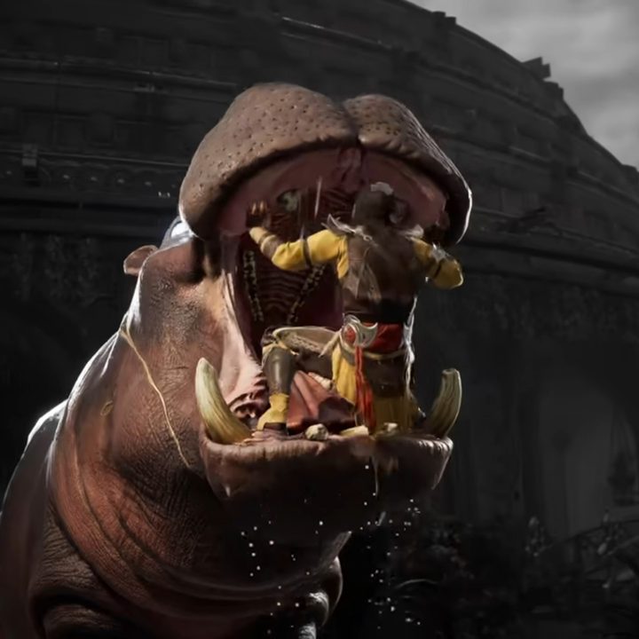 Liu Kang in yellow getting eaten by a large hippo.