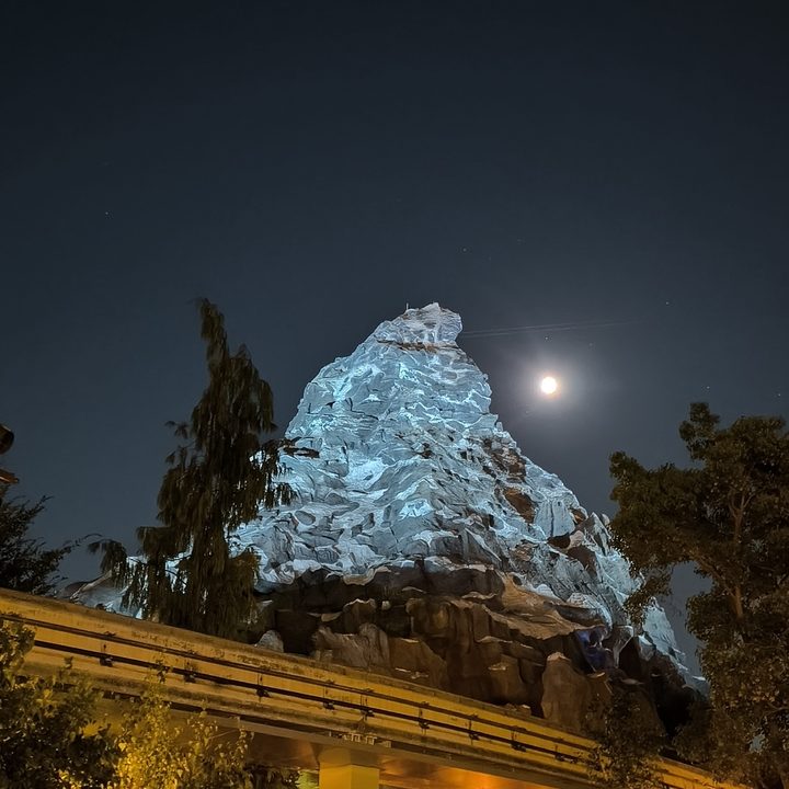 Matterhorn at night with moon taken with a Motorola Razr 2024.