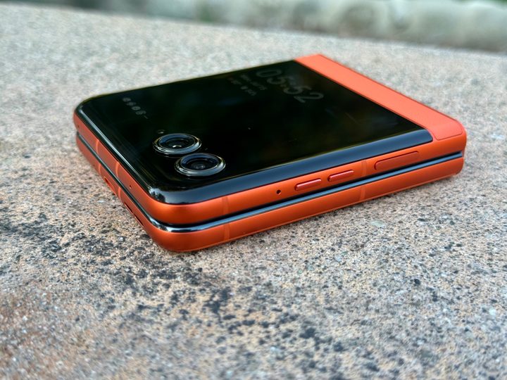 Motorola Razr 2024 in Spritz Orange closed flat angled view.
