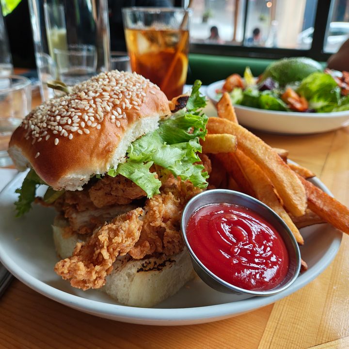 A photo of a chicken sandwich with fries, taken with the Motorola Razr Plus 2024.