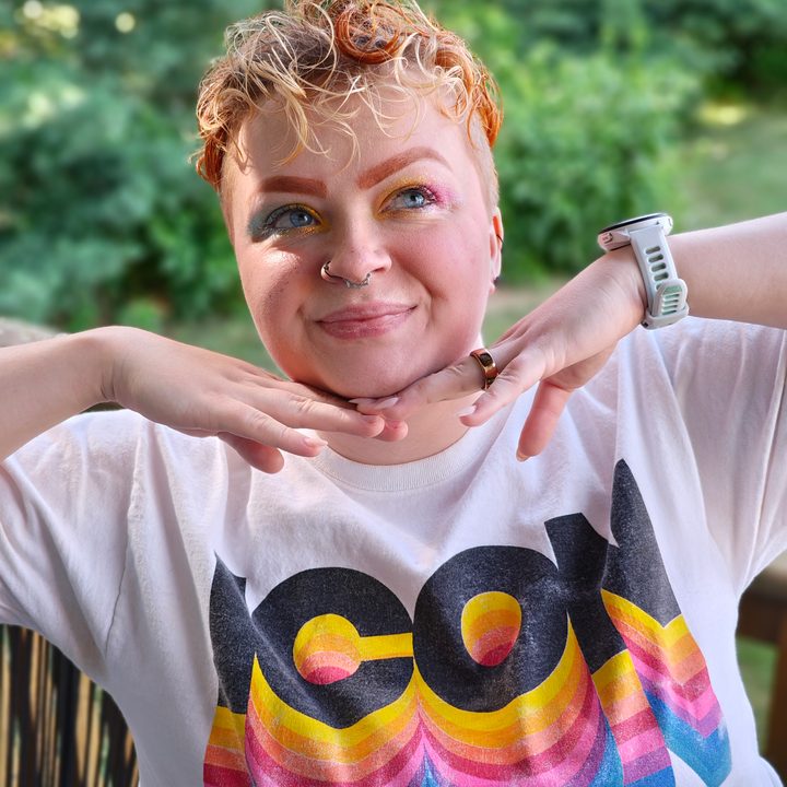 A portrait photo of a person with short blond hair, taken with the Motorola Razr Plus 2024.