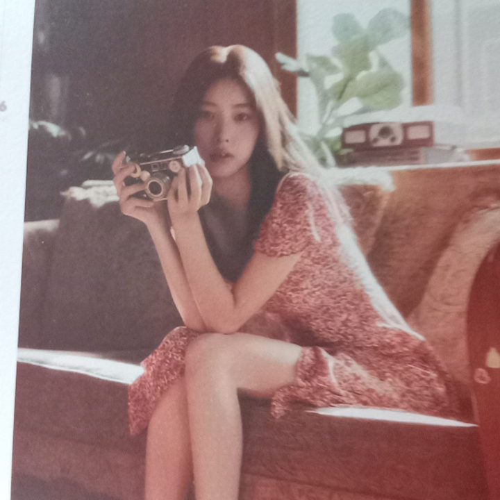 An original photo taken with the Rabbit R1, showing a page from a calendar.