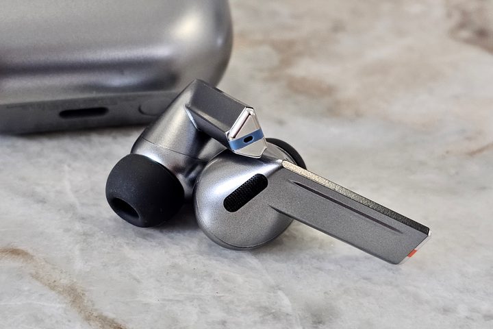 Samsung Galaxy Buds 3 Pro, in front of case.