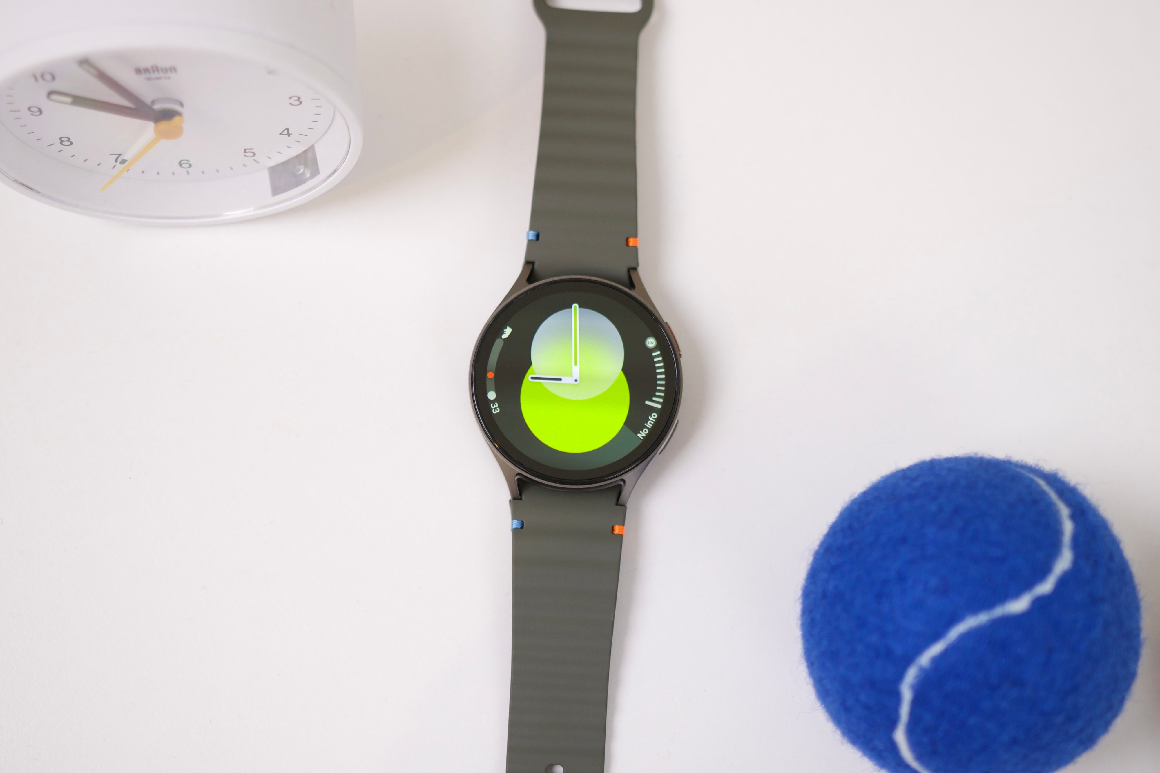 The Samsung Galaxy Watch 7 laying on a table.