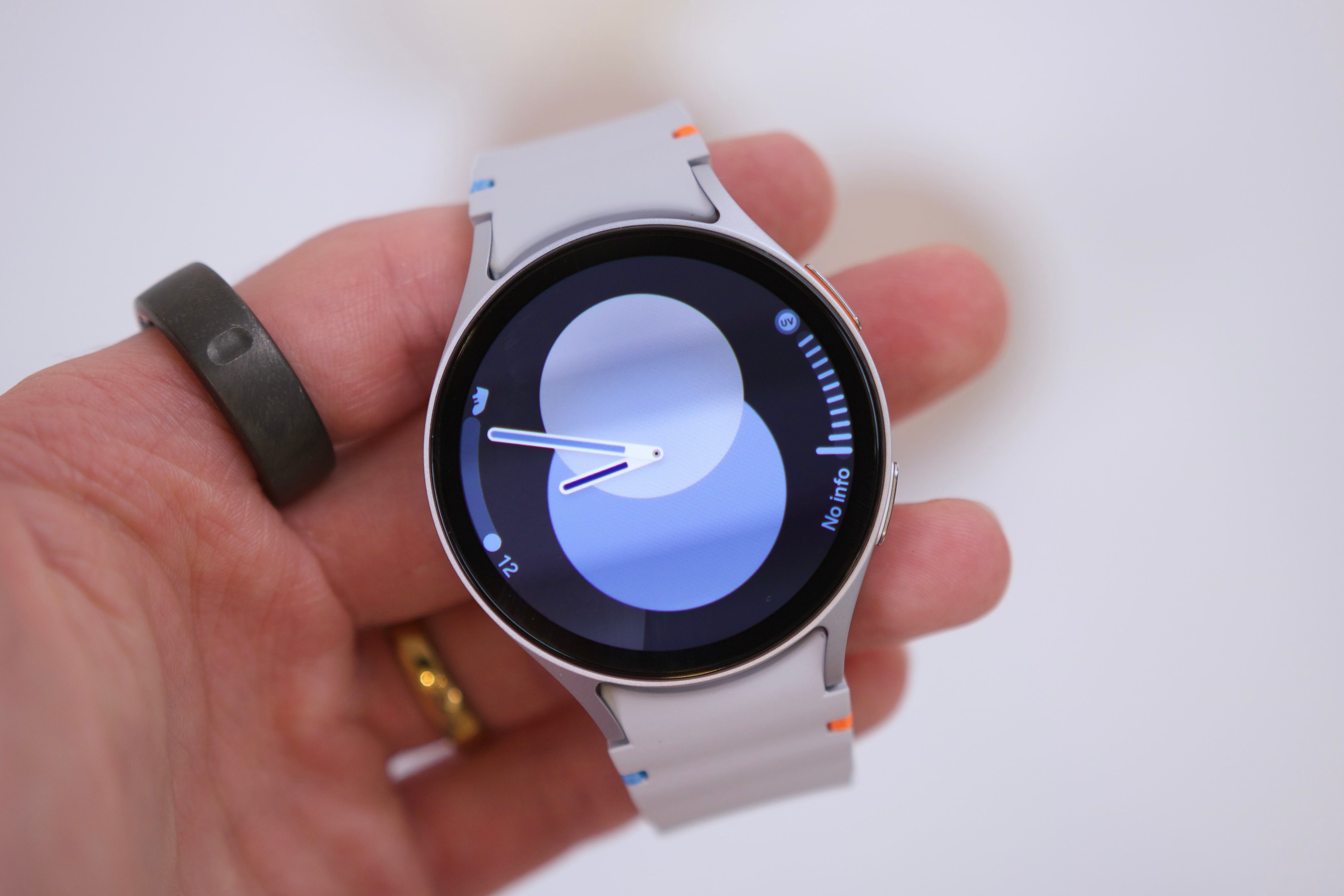 Someone holding the Samsung Galaxy Watch 7.