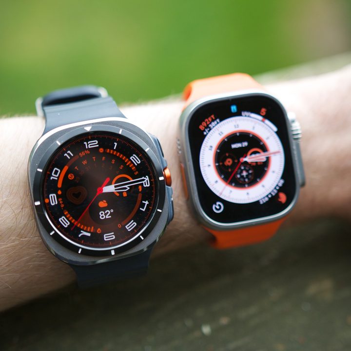 Someone wearing the Samsung Galaxy Watch Ultra and Apple Watch Ultra 2 on the same wrist.