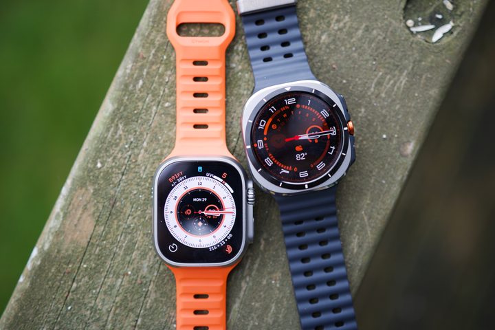The Samsung Galaxy Watch Ultra and Apple Watch Ultra 2 sitting next to each other.