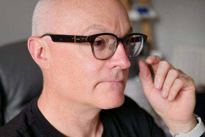 A person wearing the Solos AirGo 3 smart glasses.
