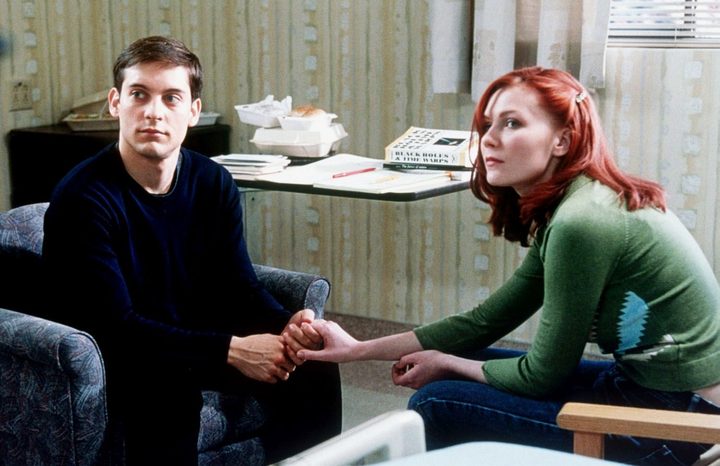 A man and a woman talk in Spider-Man.