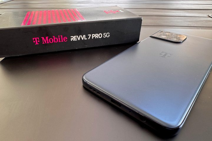 T-Mobile REVVL 7 PRO 5G next to box.