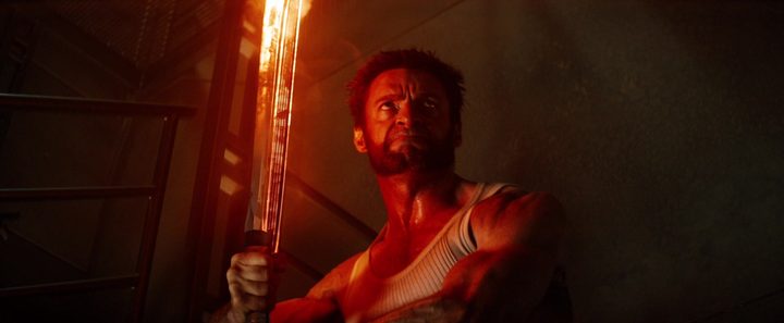 Logan (Hugh Jackman) wields a red hot buster sword in The Wolverine.