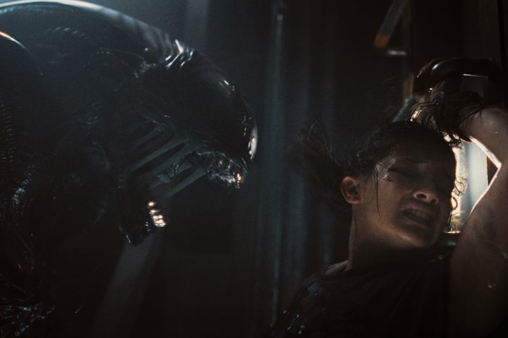 A Xenomorph screams at Rain in Alien: Romulus.