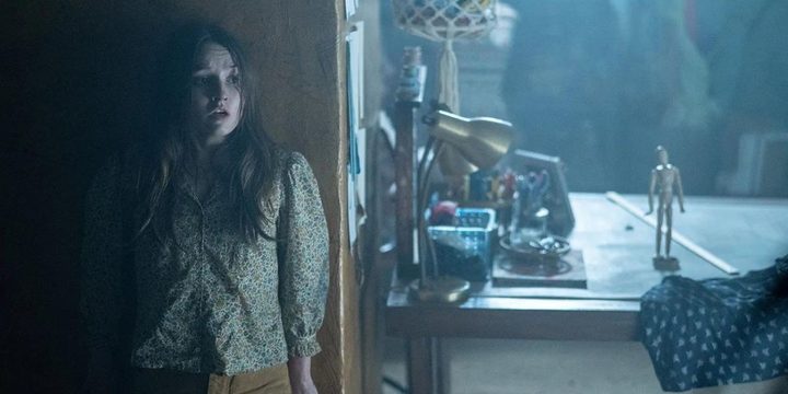 A young girl hides from an alien in No One Will Save You