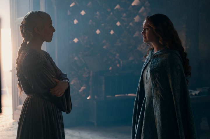 Alicent Hightower stands in front of Rhaenyra Targaryen in House of the Dragon season 2.