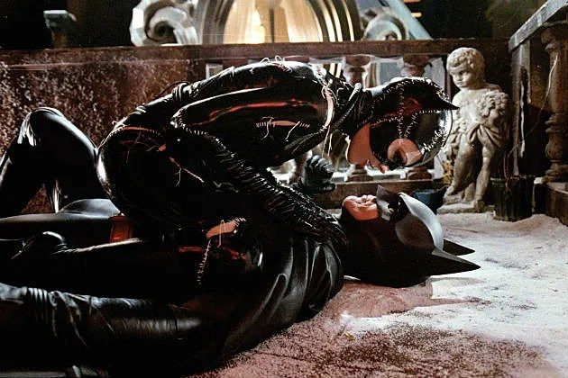 Michelle Pfeiffer pins Michael Keaton in Batman Returns.
