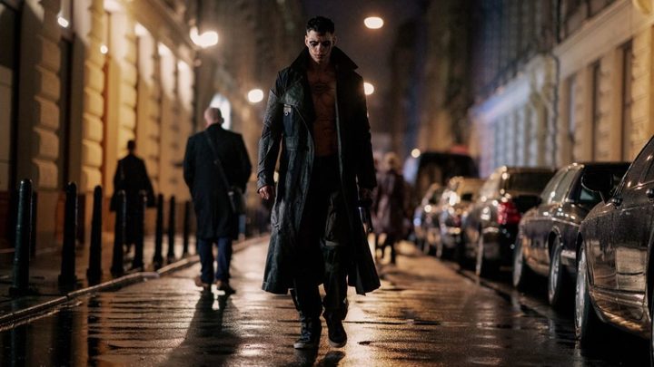 Bill Skarsgård as Eric Draven walking down the street in The Crow