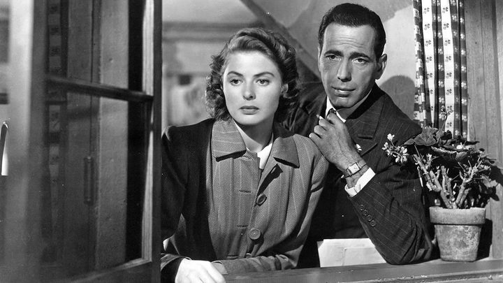 Ingrid Bergman and Humphrey Bogart watch as the Nazis overrun Paris in Casablanca.