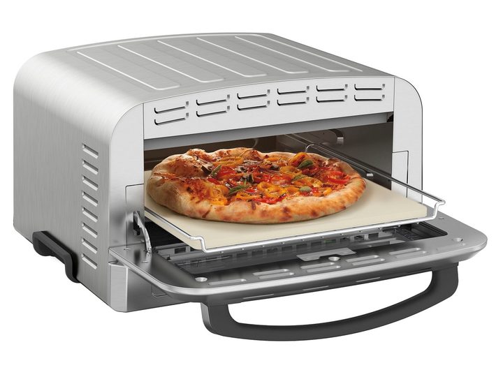 The Cuisinart Indoor Pizza Oven with a pizza inside.