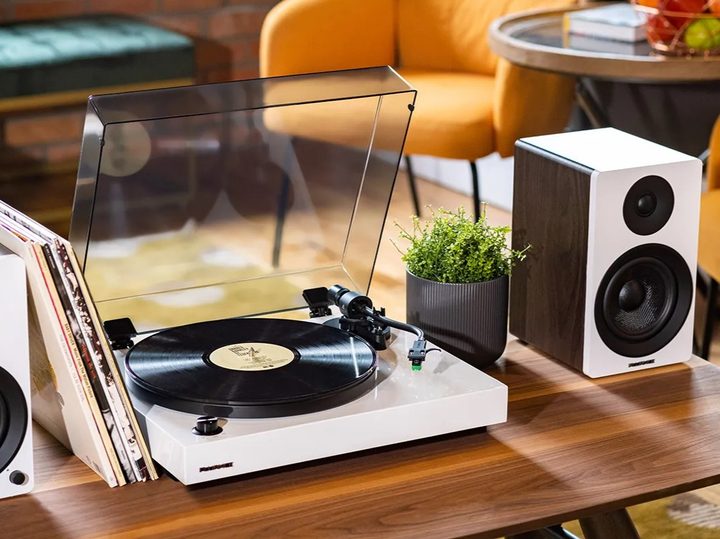 Fluance RT81 plus turntable on table in home playing a record