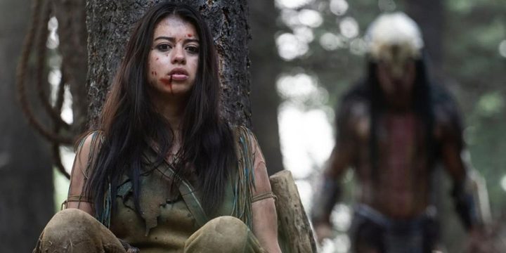 Naru hides from the Predator in Prey movie