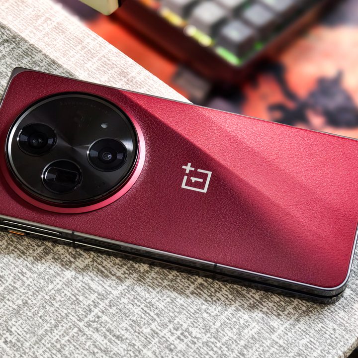 OnePlus Open Apex Edition Crimson Shadow red on table.